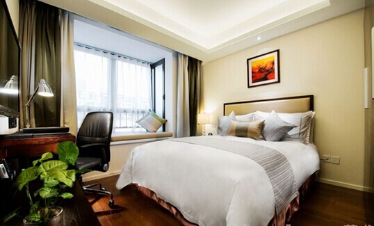 上海寰星酒店豪华套房－卧室